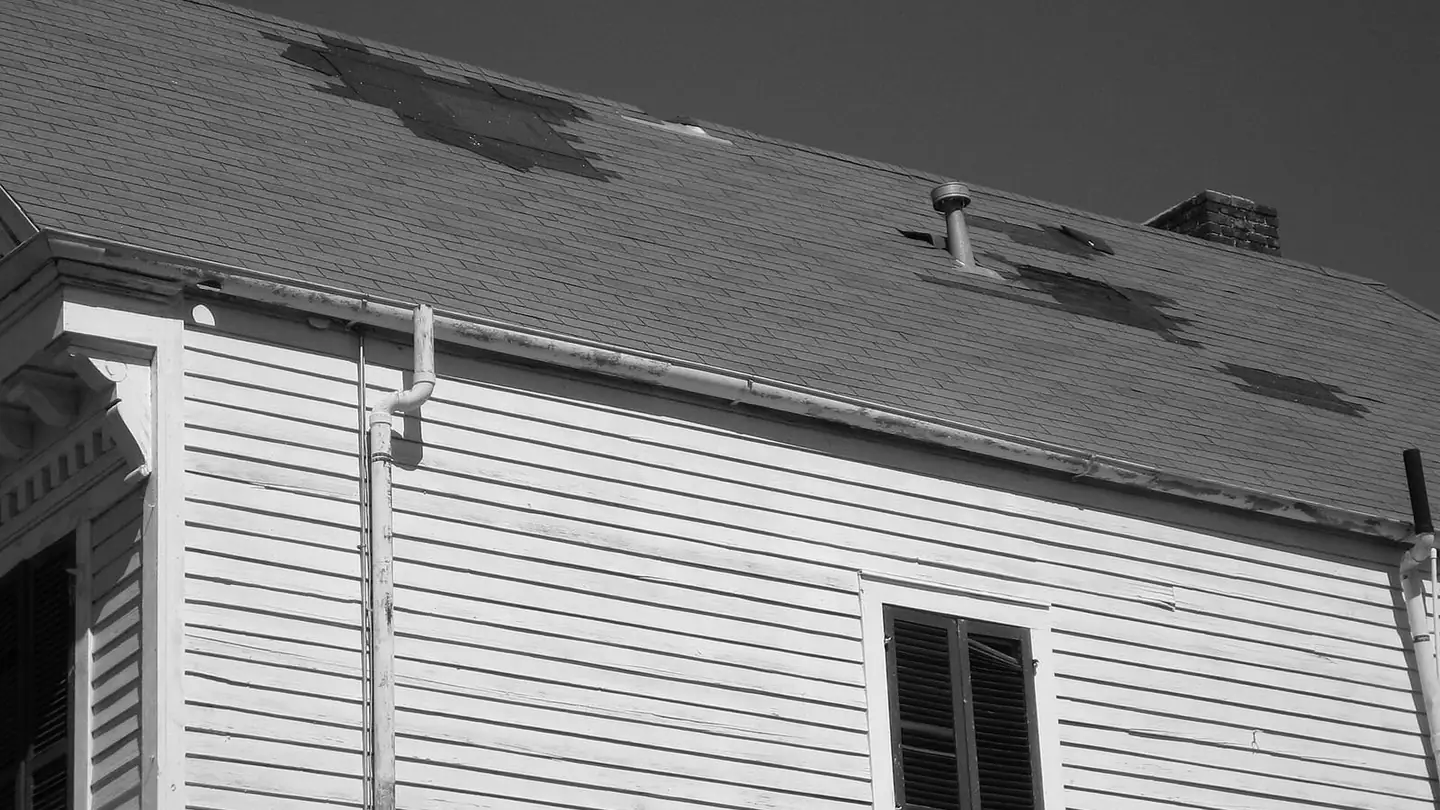 Storm-damaged roof on a house